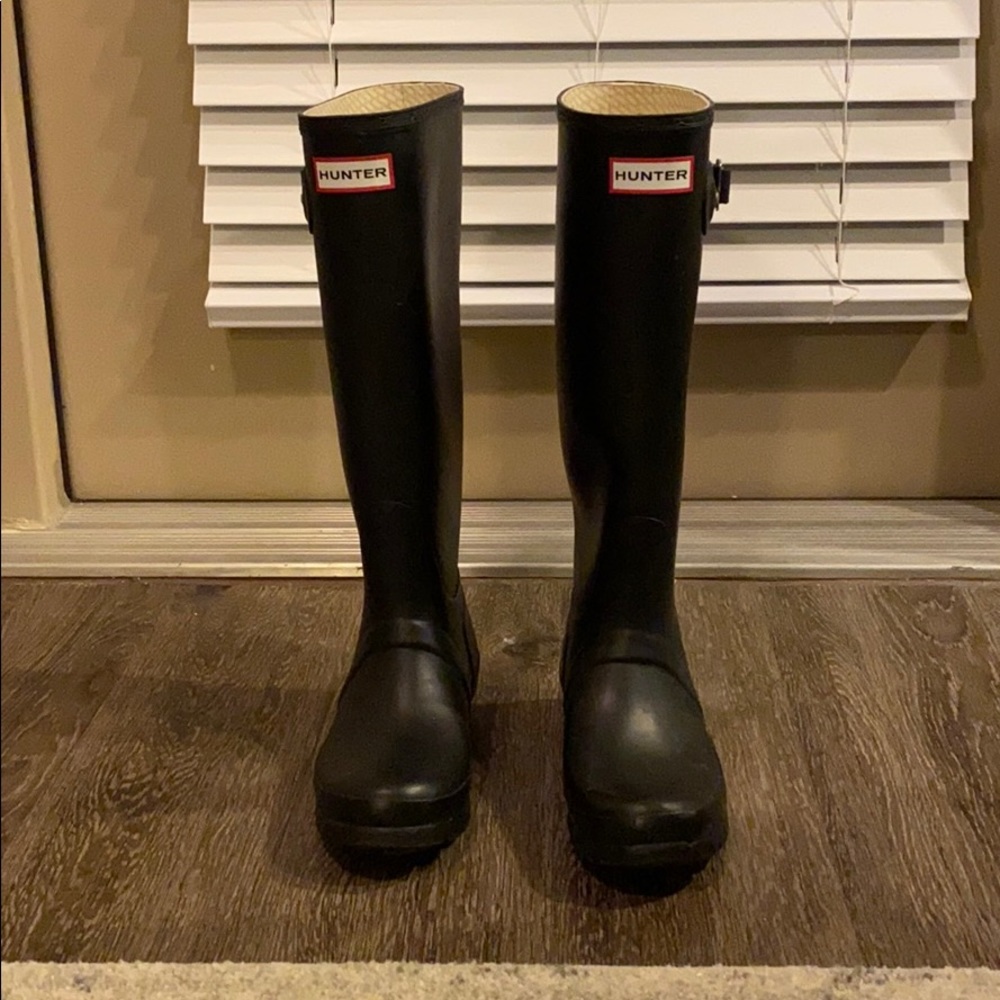 Tall black Hunter rain boots